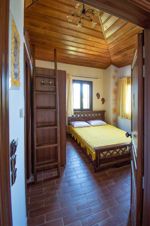 Posteľ alebo postele v izbe v ubytovaní Traditional Guesthouse 4 Epoches