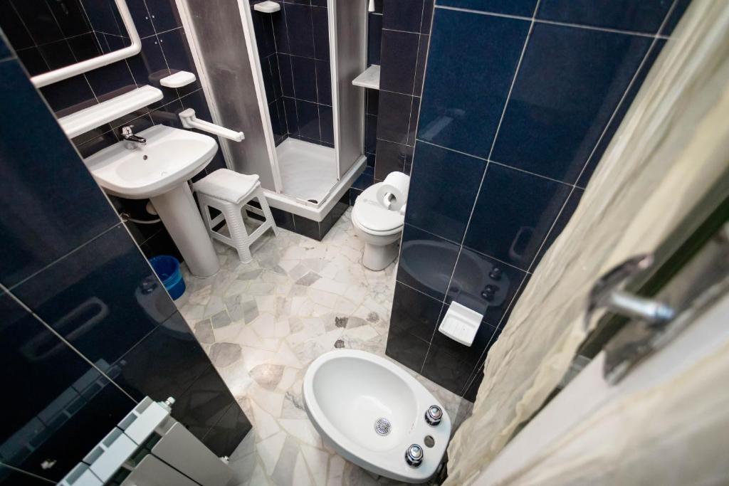 Koupelna v ubytování Mini Hotel