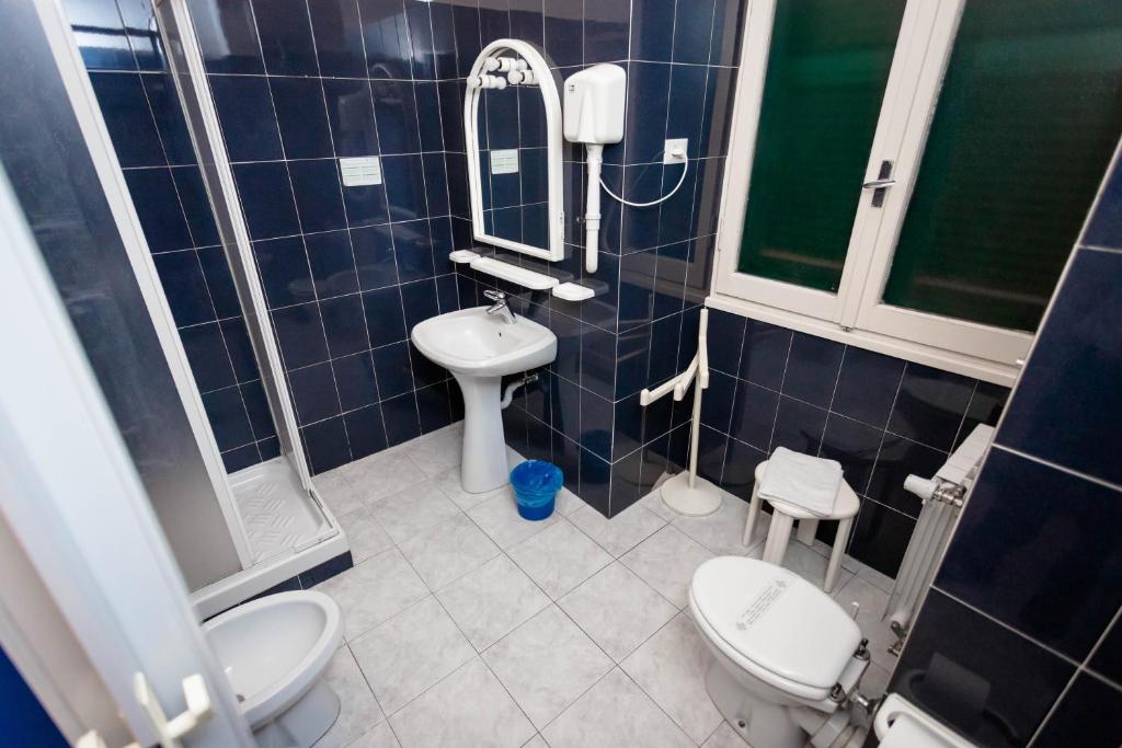 Koupelna v ubytování Mini Hotel