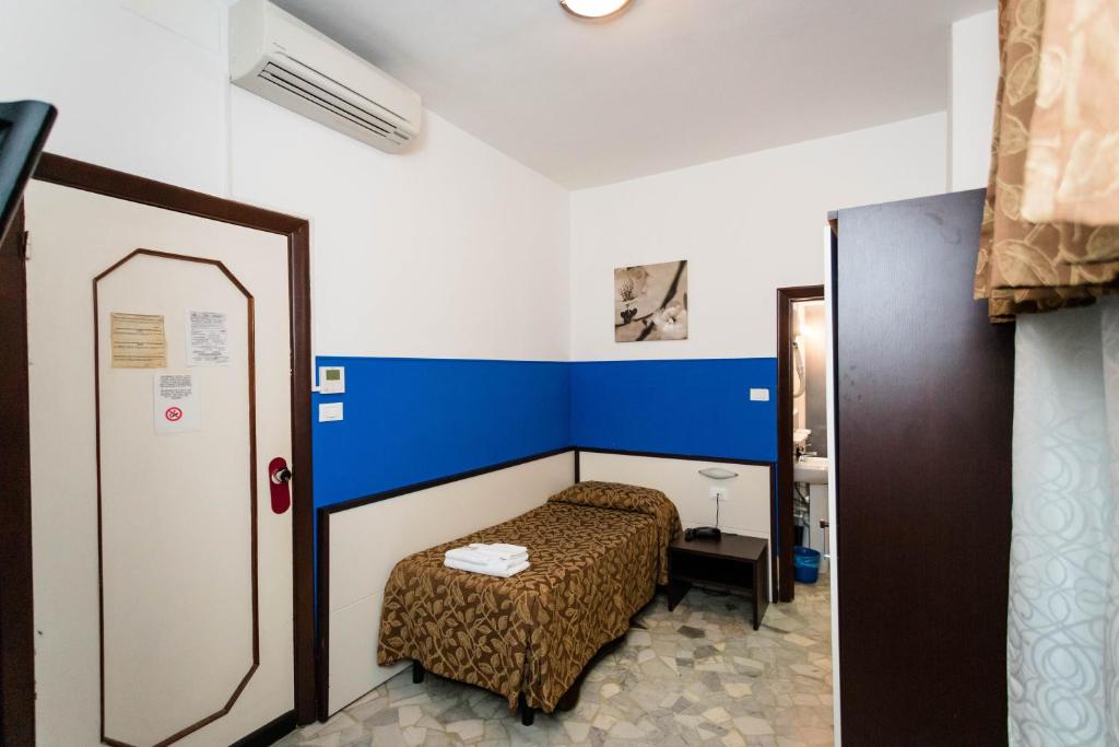 Postel nebo postele na pokoji v ubytování Mini Hotel