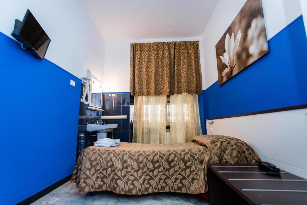 TV a/nebo společenská místnost v ubytování Mini Hotel