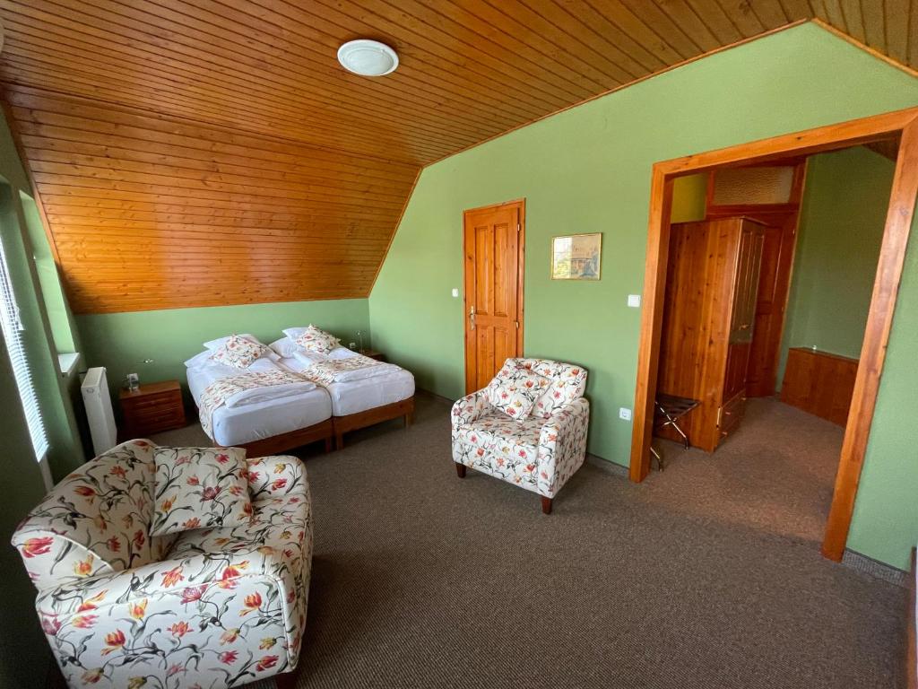 Posteľ alebo postele v izbe v ubytovaní Villa Astoria