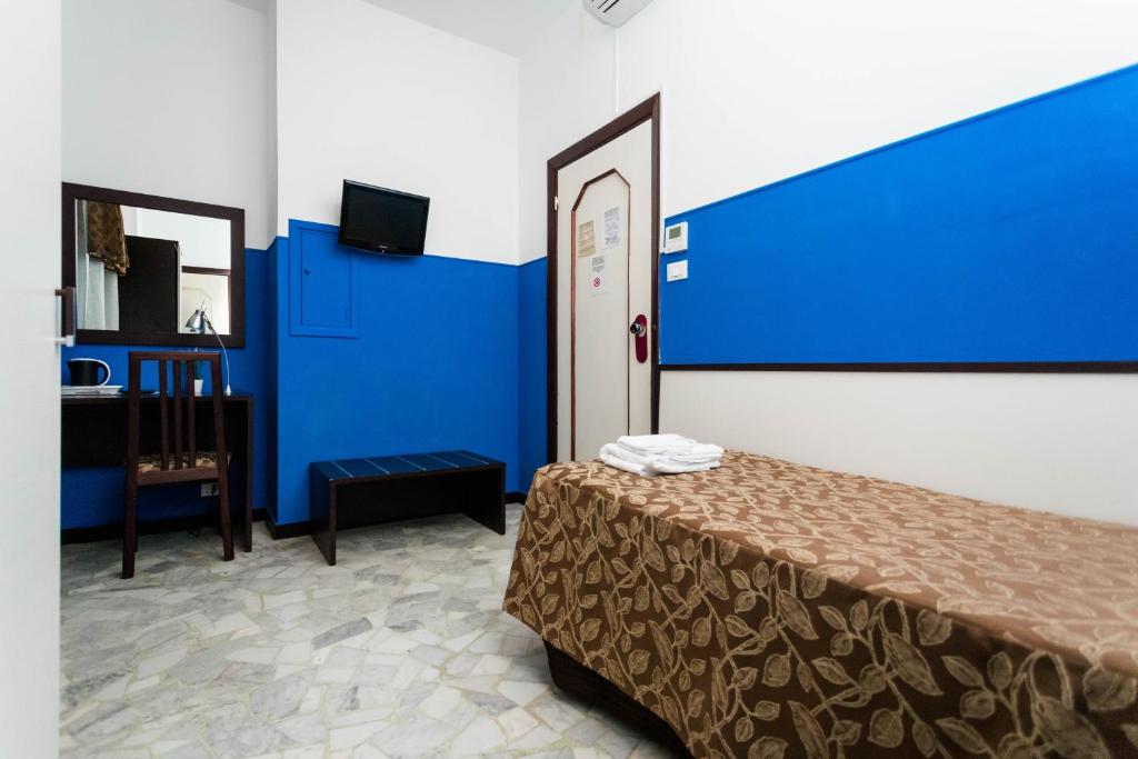 Postel nebo postele na pokoji v ubytování Mini Hotel
