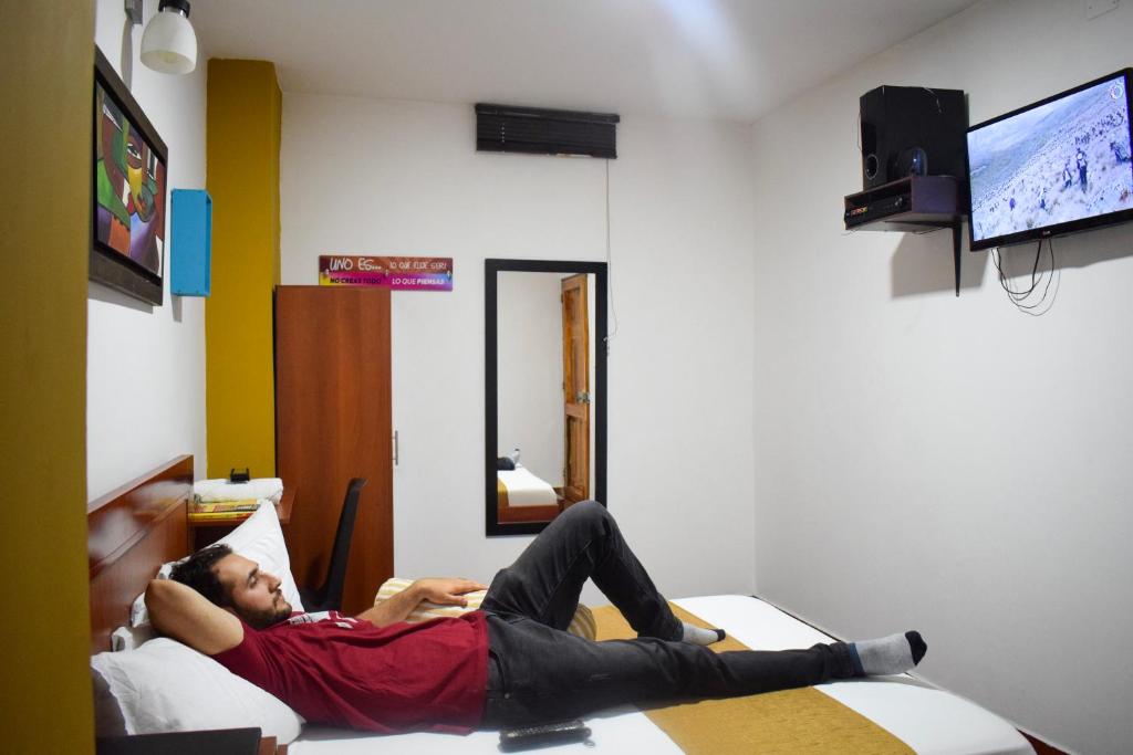 TV a/nebo společenská místnost v ubytování Hotel Brisas De Calima