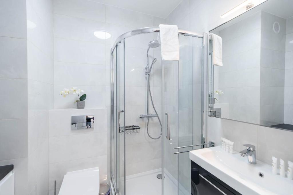 Kúpeľňa v ubytovaní Apartment Flamingo 41 by Noclegi Renters