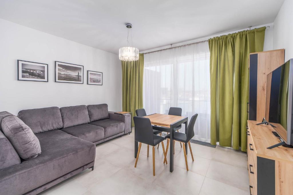 Posedenie v ubytovaní Apartment Flamingo 41 by Noclegi Renters