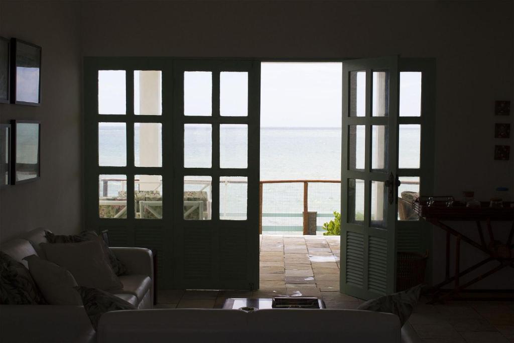  Casa dos Bons Ventos com varanda frente mar por Carpediem