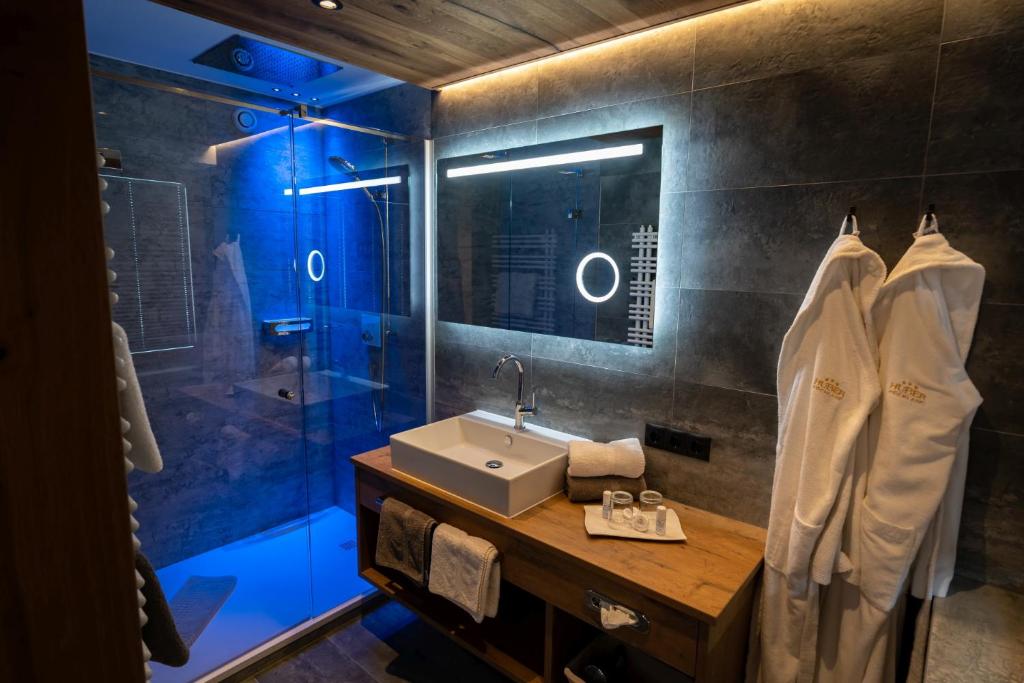 Koupelna v ubytování Hotel Huber Hochland