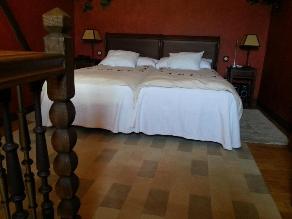 Postel nebo postele na pokoji v ubytování Hotel Rural Peña Del Alba