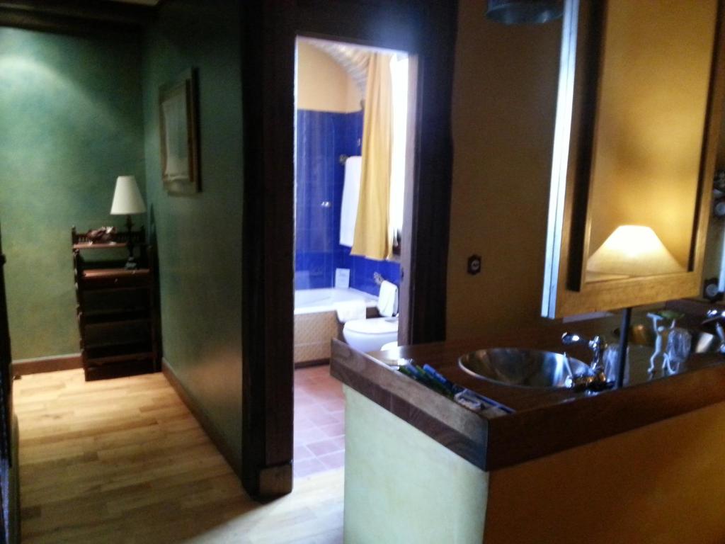 Postel nebo postele na pokoji v ubytování Hotel Rural Peña Del Alba