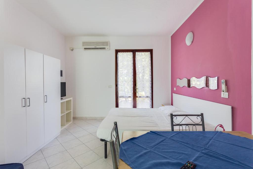 Posteľ alebo postele v izbe v ubytovaní Residence Blu Marlin Natural beach