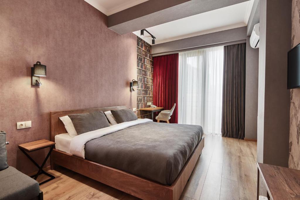 Postel nebo postele na pokoji v ubytování Hotel City