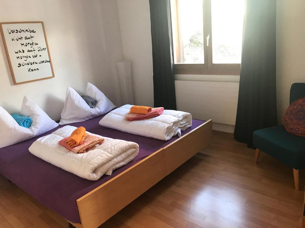 Letto o letti in una camera di Lärchenwald Lodge