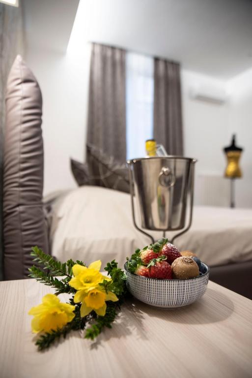 Postel nebo postele na pokoji v ubytování Fervore Luxury Rooms