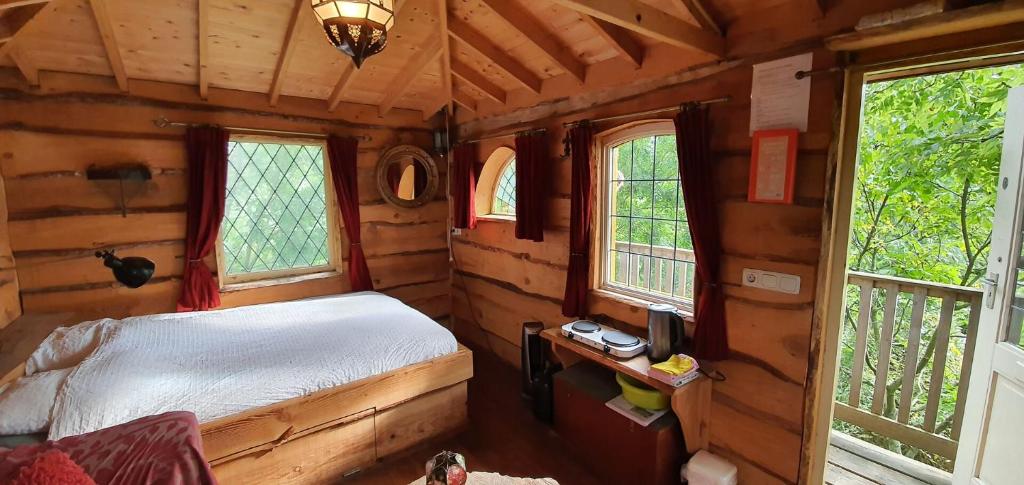 Postel nebo postele na pokoji v ubytování Het Kleine Paradijs