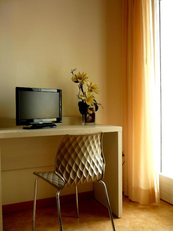 TV a/nebo společenská místnost v ubytování Hotel Solemare