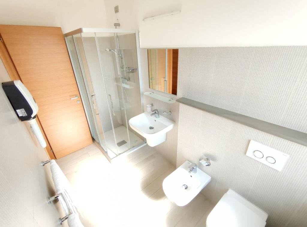 Koupelna v ubytování Hotel Capitano