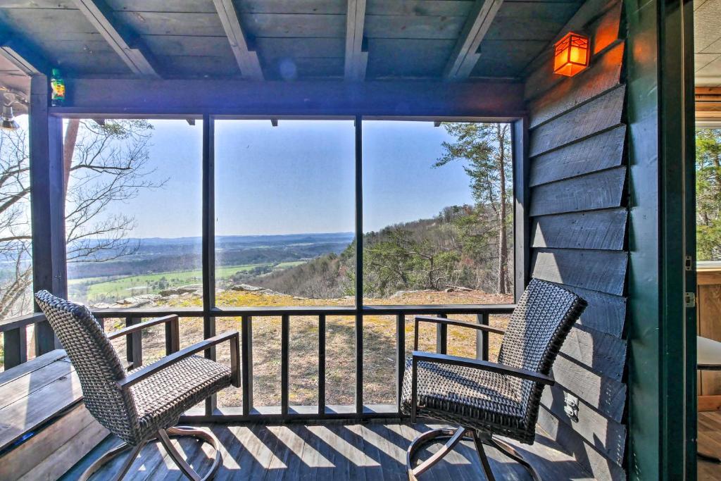 two chairs on a porch with a view of the mountains at Secluded Ridgetop Hideaway with Valley Views! in Menlo