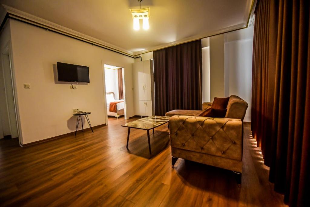 TV a/nebo společenská místnost v ubytování Rosa Therapy Butik Otel