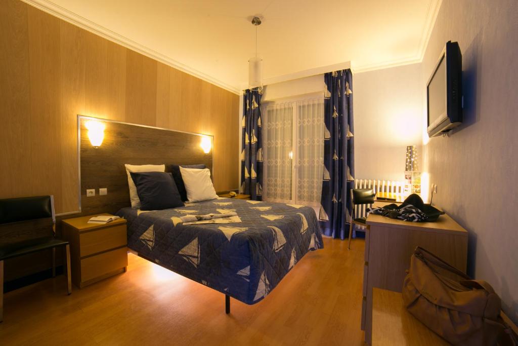 Cama o camas de una habitación en BreizH HoteL