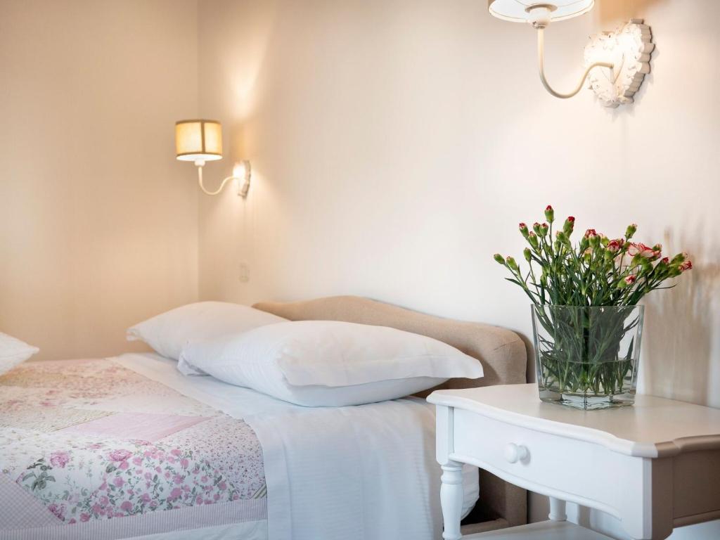 A bed or beds in a room at Belvilla by OYO Tulipano