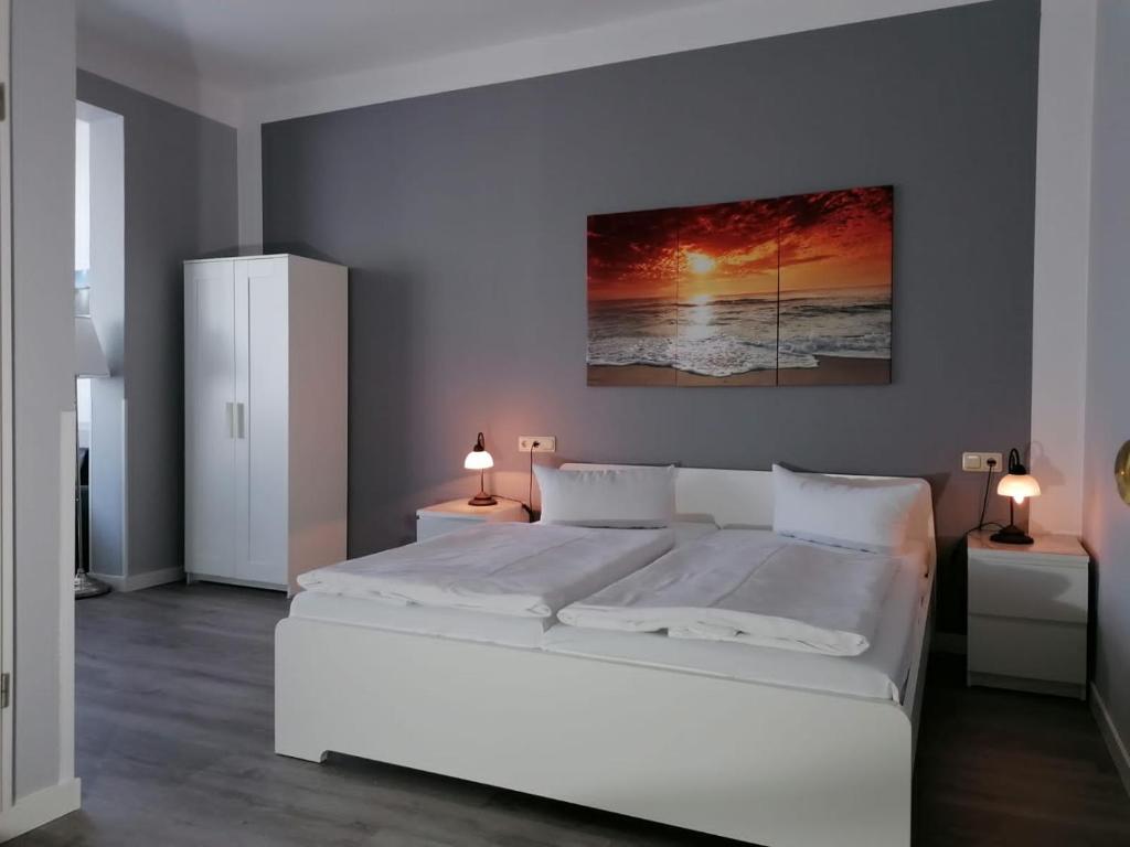 Postel nebo postele na pokoji v ubytování Hotel Villa Fröhlich