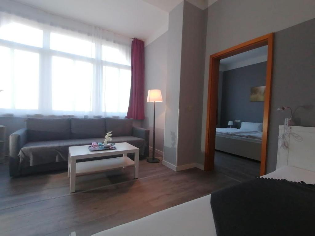 Postel nebo postele na pokoji v ubytování Hotel Villa Fröhlich