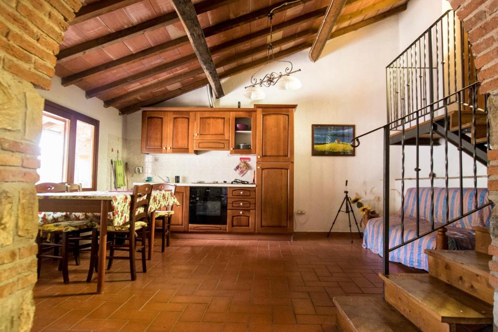 Kuchyňa alebo kuchynka v ubytovaní Apartment immersed in the green of the Maremma