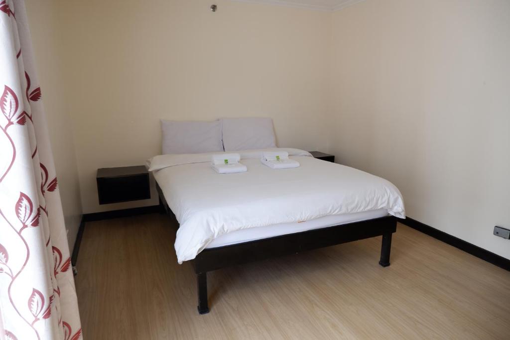 Postel nebo postele na pokoji v ubytování Albergo Hotel