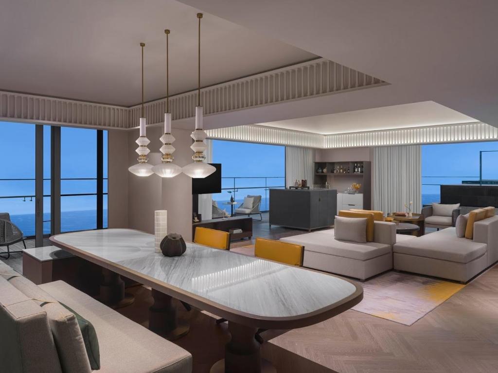 TV a/nebo společenská místnost v ubytování Hoiana Hotel & Suites
