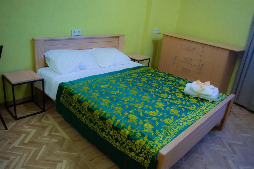 Postel nebo postele na pokoji v ubytování Sunflower Hotel