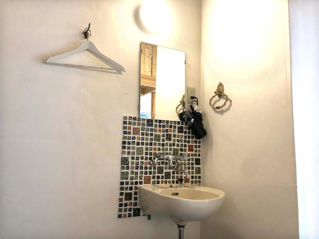 Koupelna v ubytování Hostel Yume-Nomad Kobe