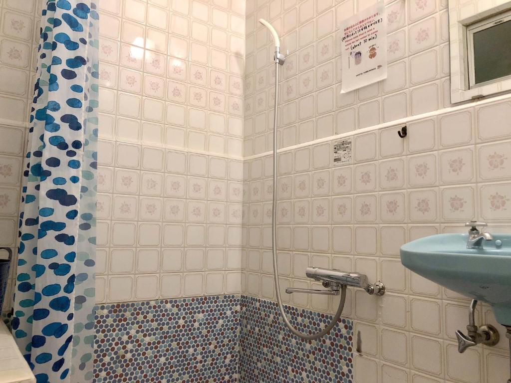 Koupelna v ubytování Hostel Yume-Nomad Kobe