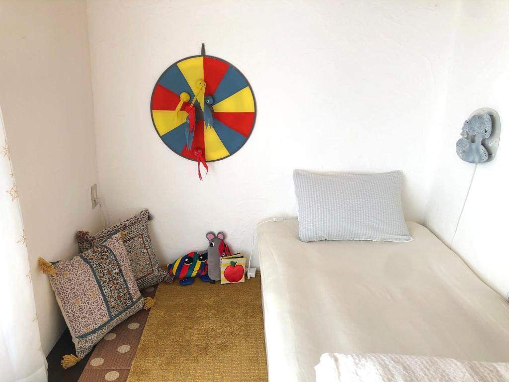 Postel nebo postele na pokoji v ubytování Hostel Yume-Nomad Kobe