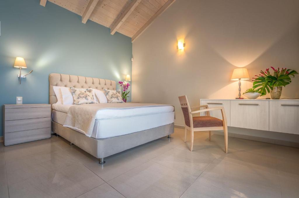 Posteľ alebo postele v izbe v ubytovaní Perla Beach Villa Perla Beach Villa