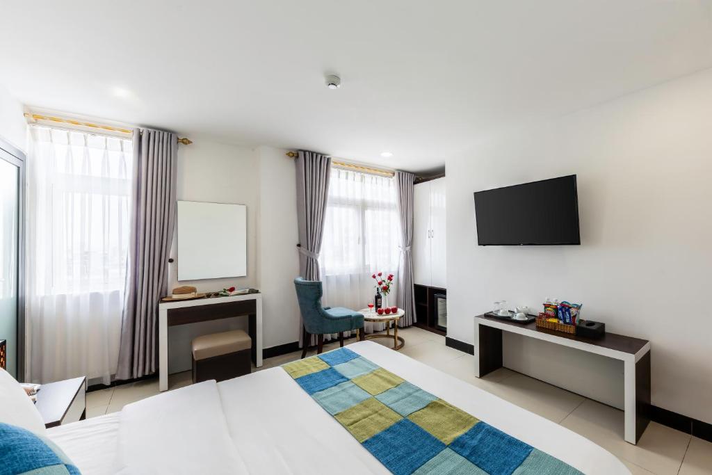 TV a/nebo společenská místnost v ubytování Phuc Thanh Luxury Hotel by THG