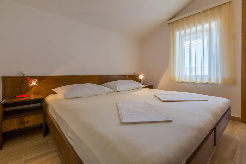 Postel nebo postele na pokoji v ubytování IRIS
