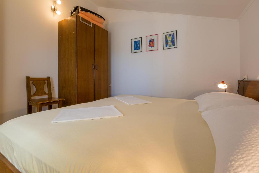 Postel nebo postele na pokoji v ubytování IRIS