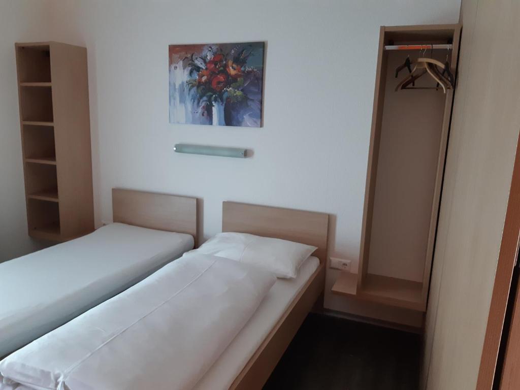 Postel nebo postele na pokoji v ubytování Motel Angern