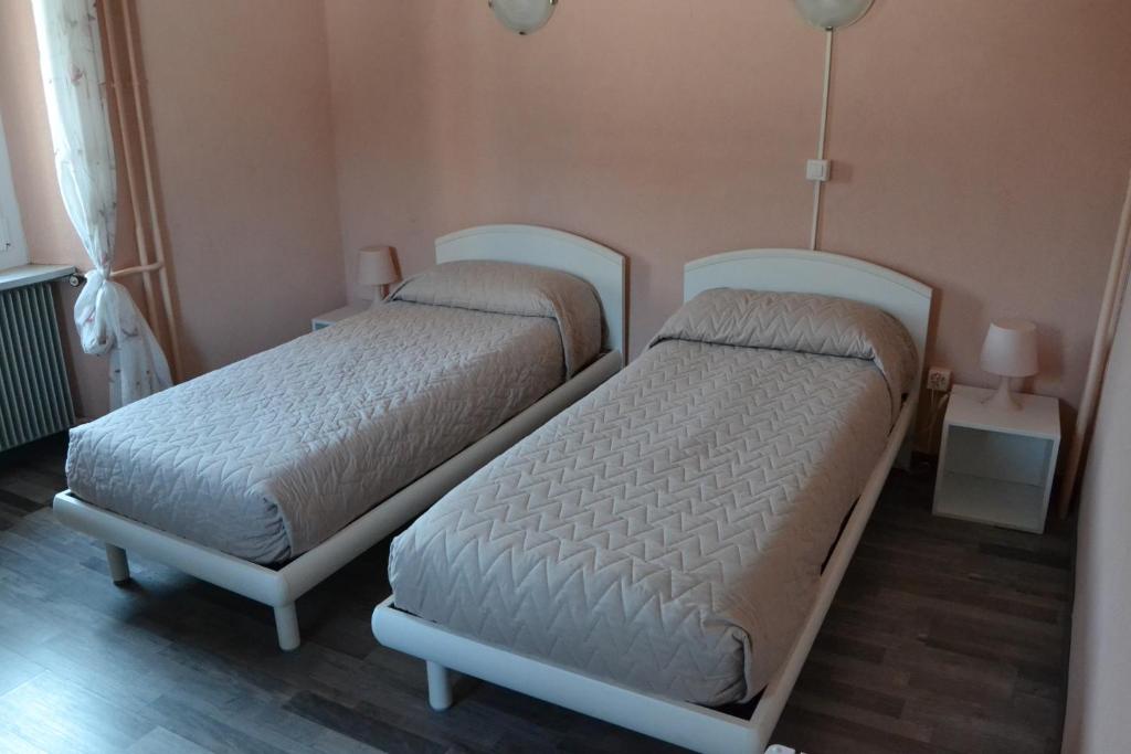 Postel nebo postele na pokoji v ubytování Casa Buby