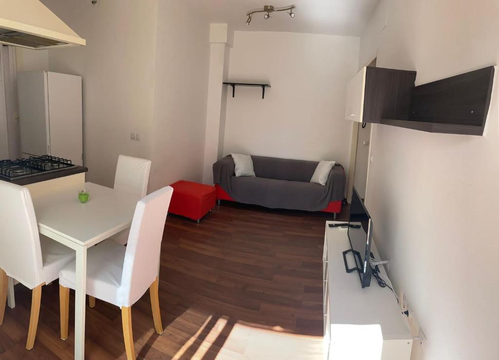 TV a/nebo společenská místnost v ubytování Apartamento con gran terraza cerca de la playa