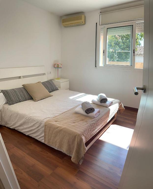 Postel nebo postele na pokoji v ubytování Apartamento con gran terraza cerca de la playa