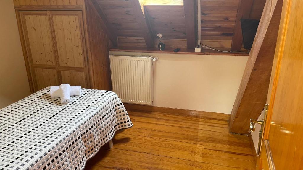 Hostal Ezkaurre reserva habitación