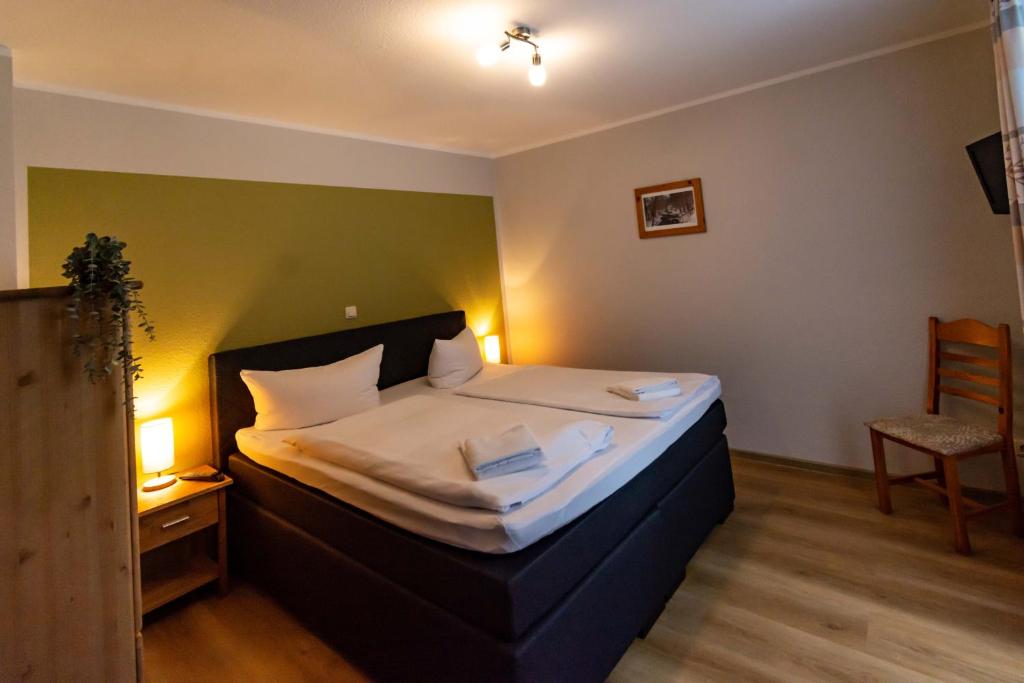 Postel nebo postele na pokoji v ubytování Hotel und Berggasthof Spießberghaus