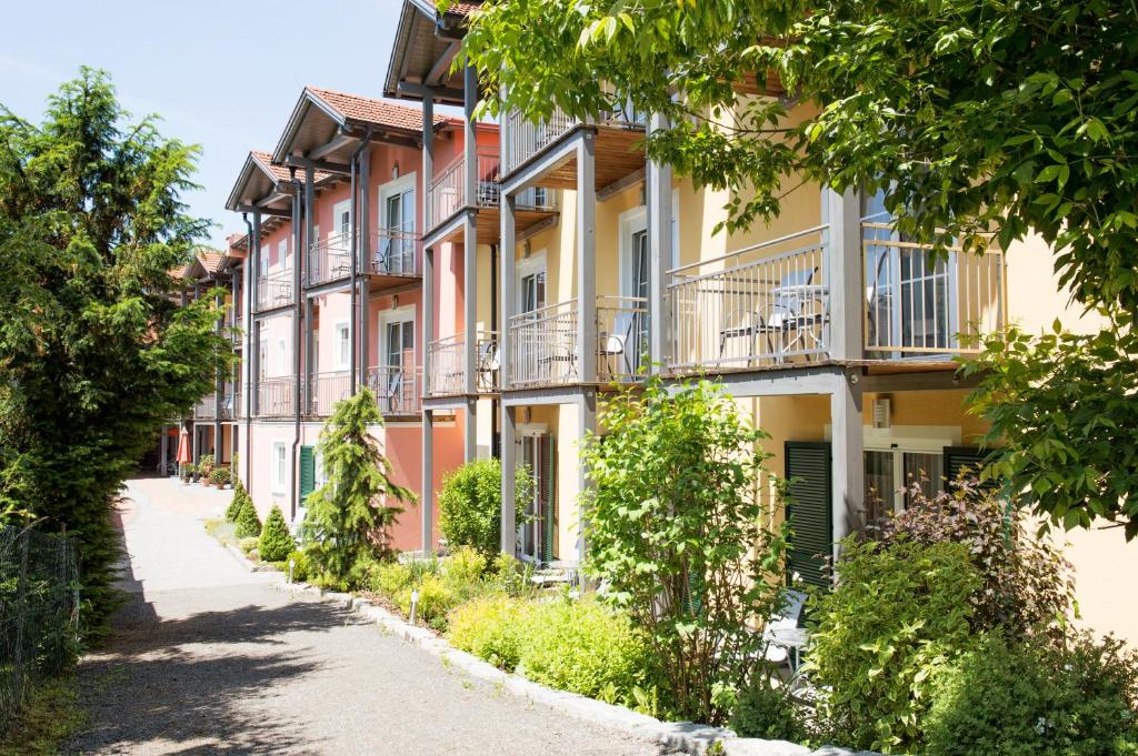 a row of apartment buildings on a street at Tscheppe Lang-Gasthof in Leutschach
