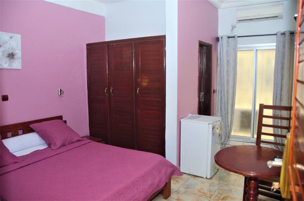 Postel nebo postele na pokoji v ubytování Hotel - Y