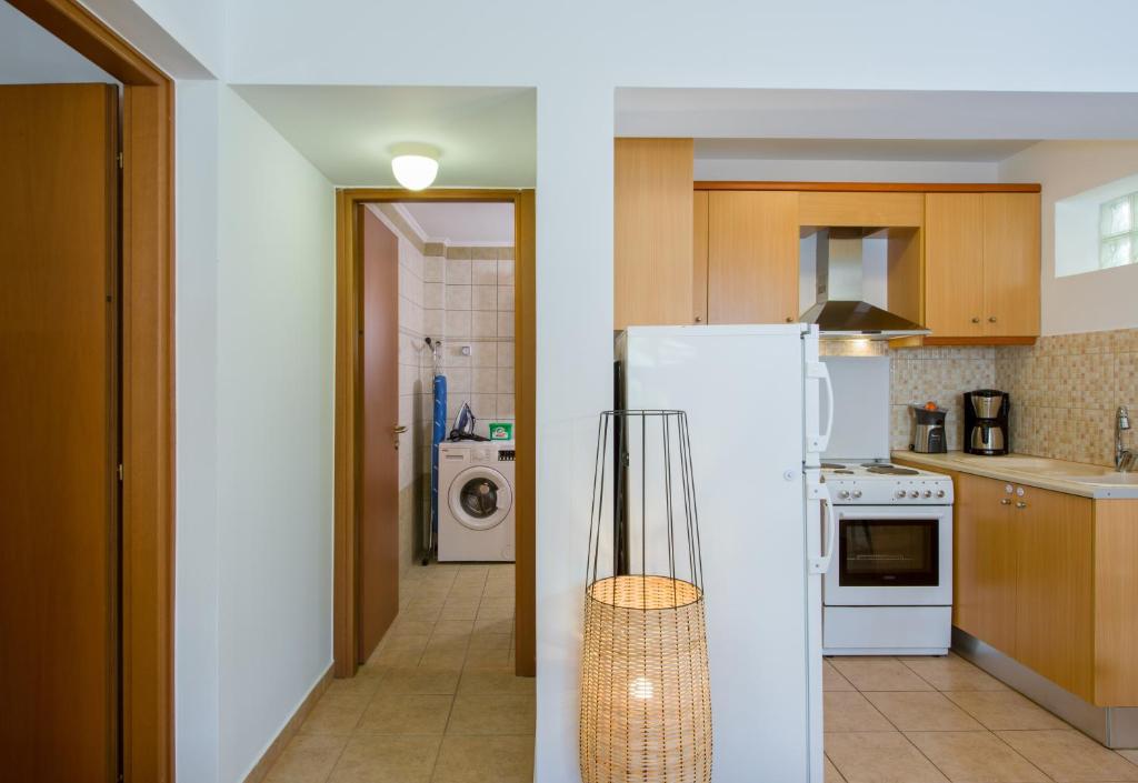 Kuchyň nebo kuchyňský kout v ubytování Manolia Dream Apartment 30m to the beach