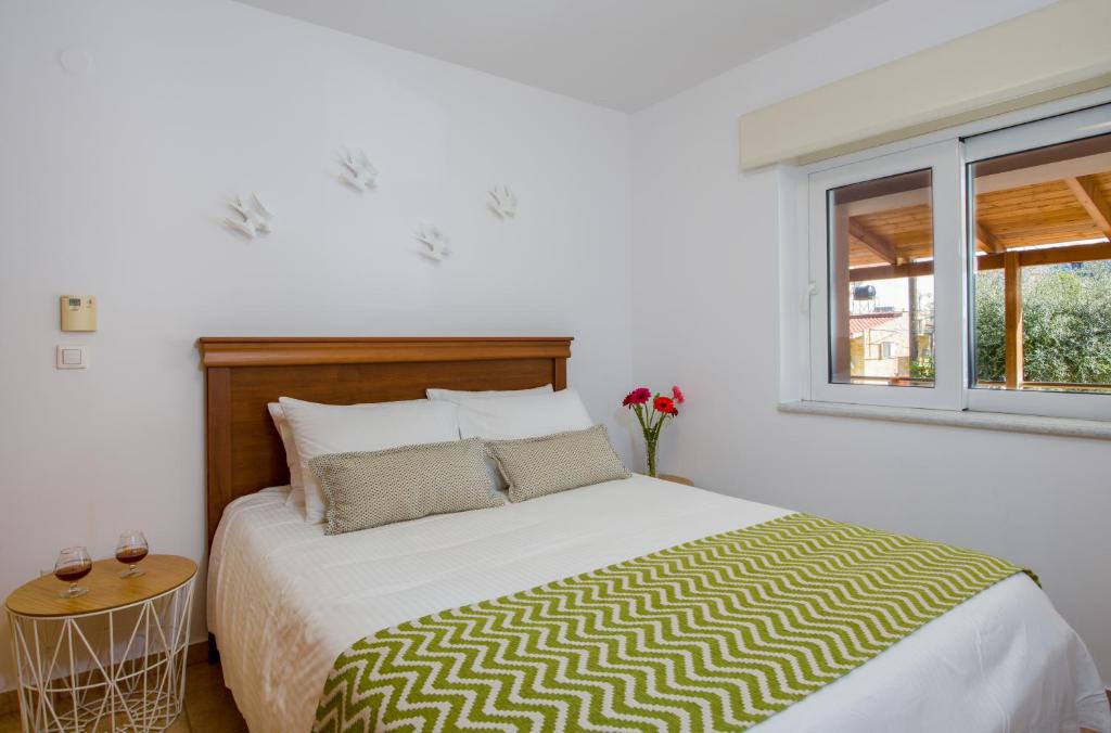 Postel nebo postele na pokoji v ubytování Manolia Dream Apartment 30m to the beach
