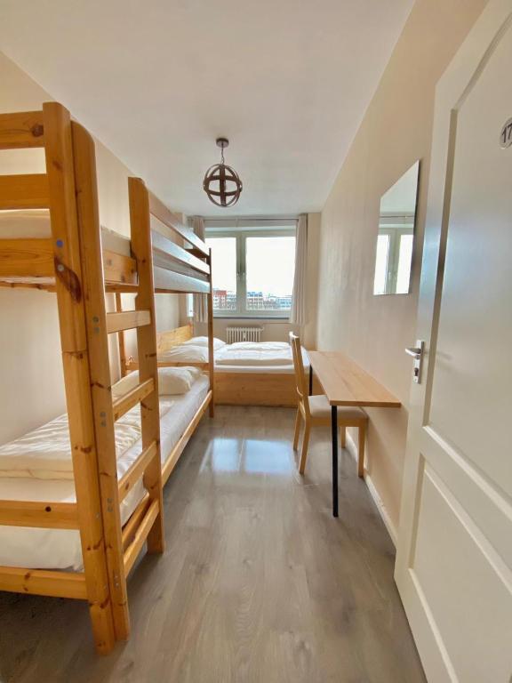 Postel nebo postele na pokoji v ubytování MAC City Hostel