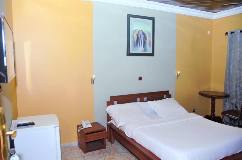 Postel nebo postele na pokoji v ubytování Hotel - Y
